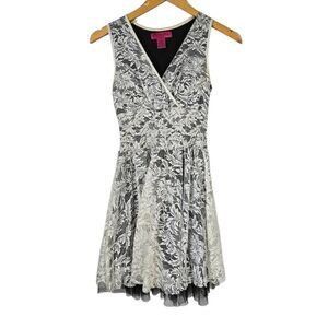 Demanding Black and White Lace Mini Dress